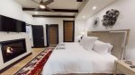 Master bedroom with a kingsize bed 